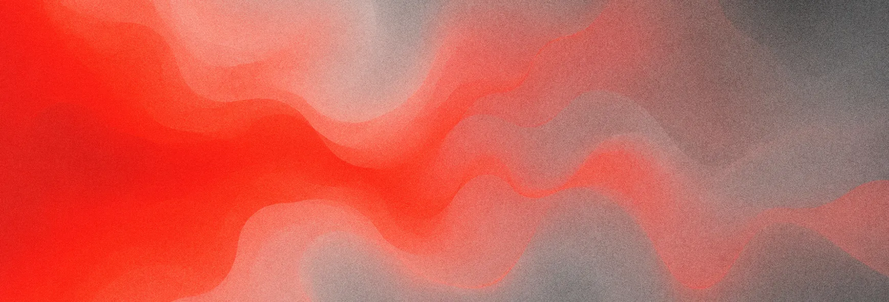 Soft grainy gradient of red and grey waves flowing from left to right